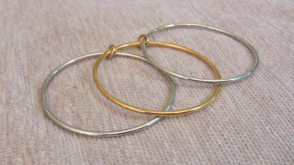Three layer linked mixed metal bangle
