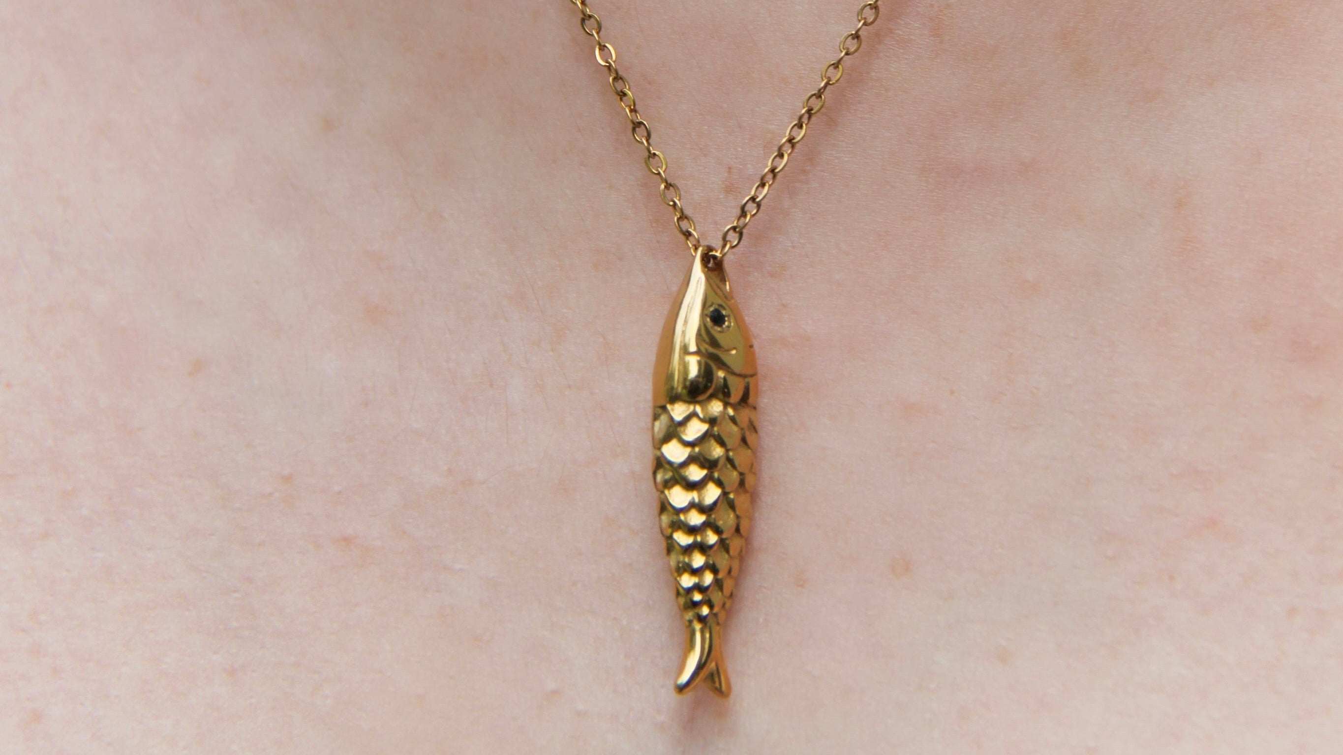 Single fish gold necklace