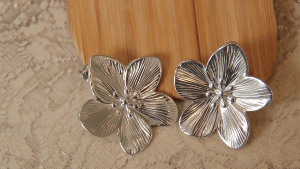 Detailed flower statement earrings