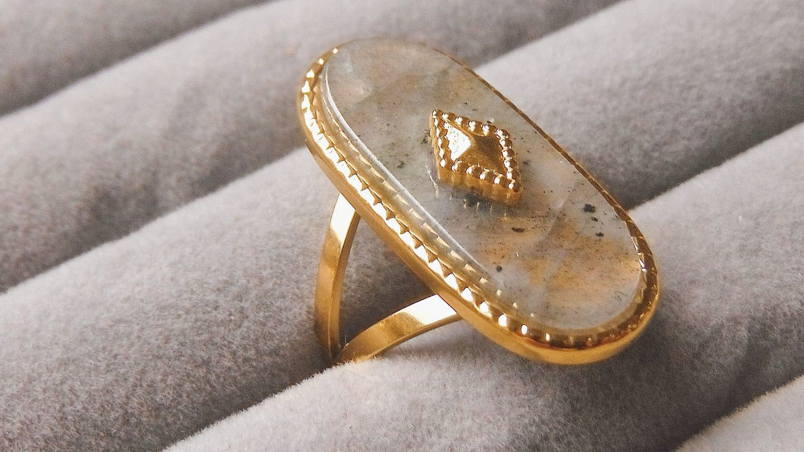 Florescent blue/green stone ring