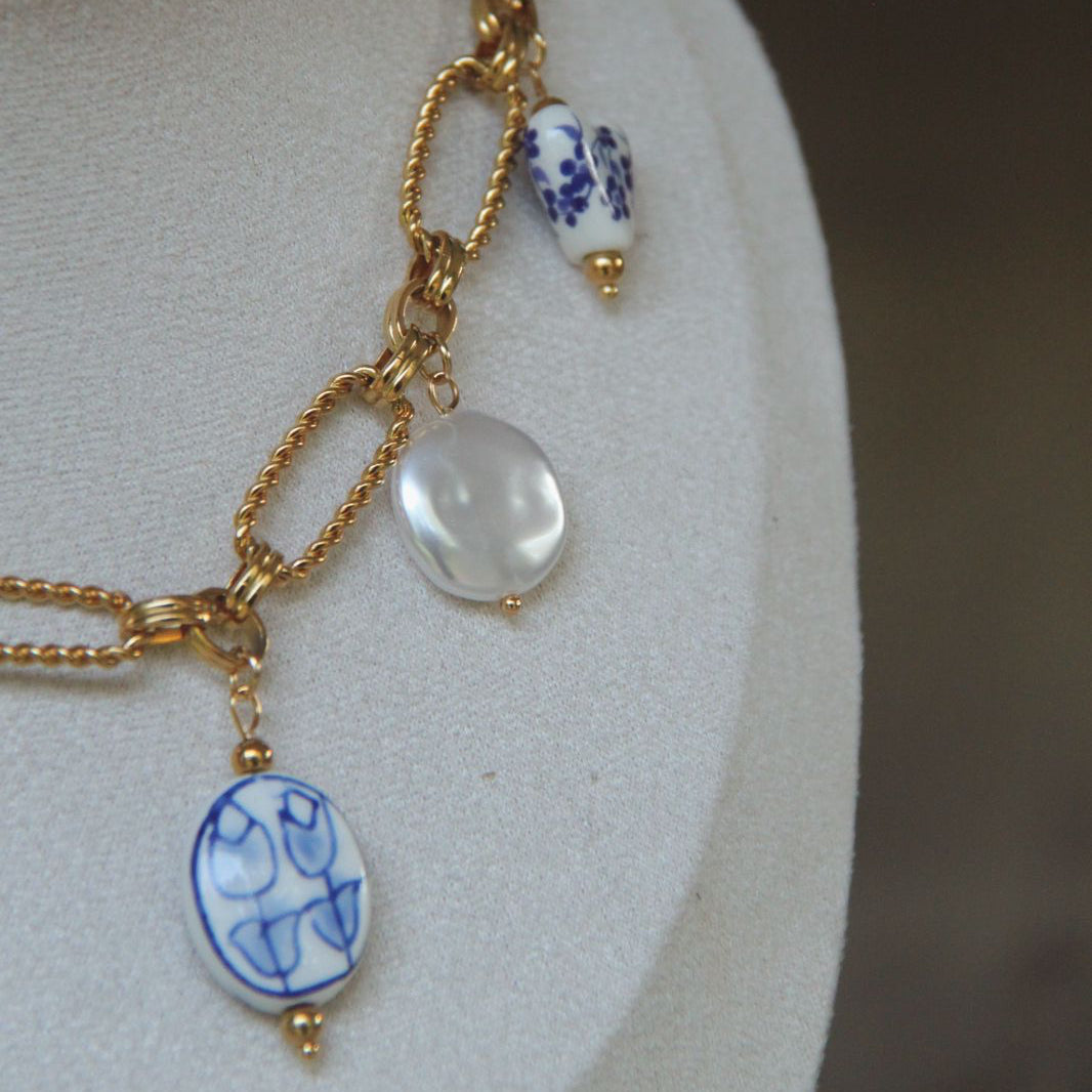 Chunky blue charm necklace