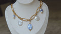 Chunky blue charm necklace