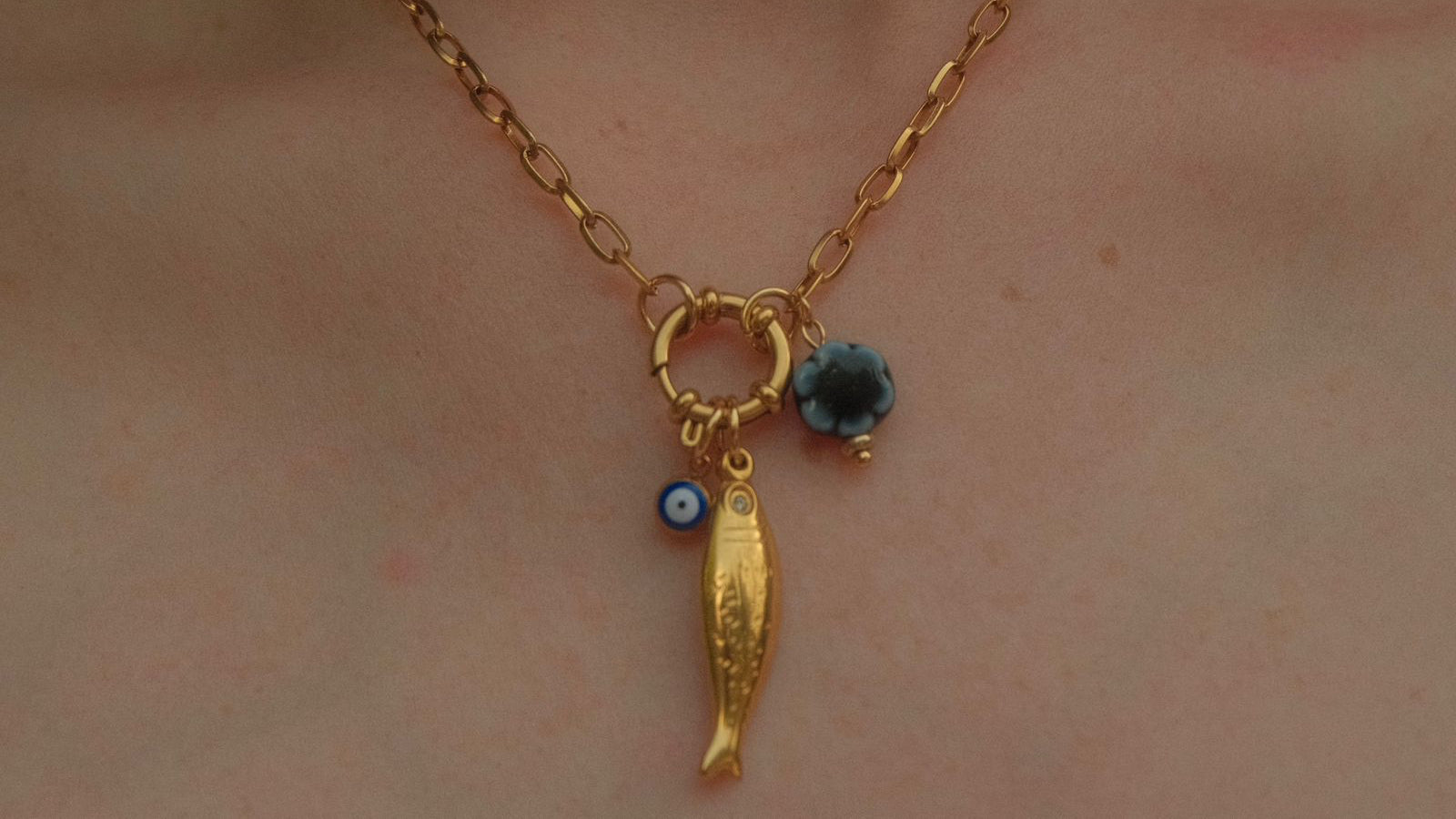 Blue fish charm necklace