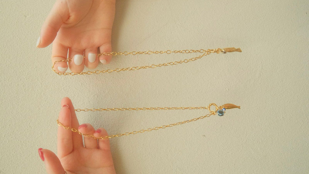 Blue fish charm necklace