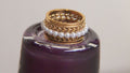 Gold bordered pearl ring